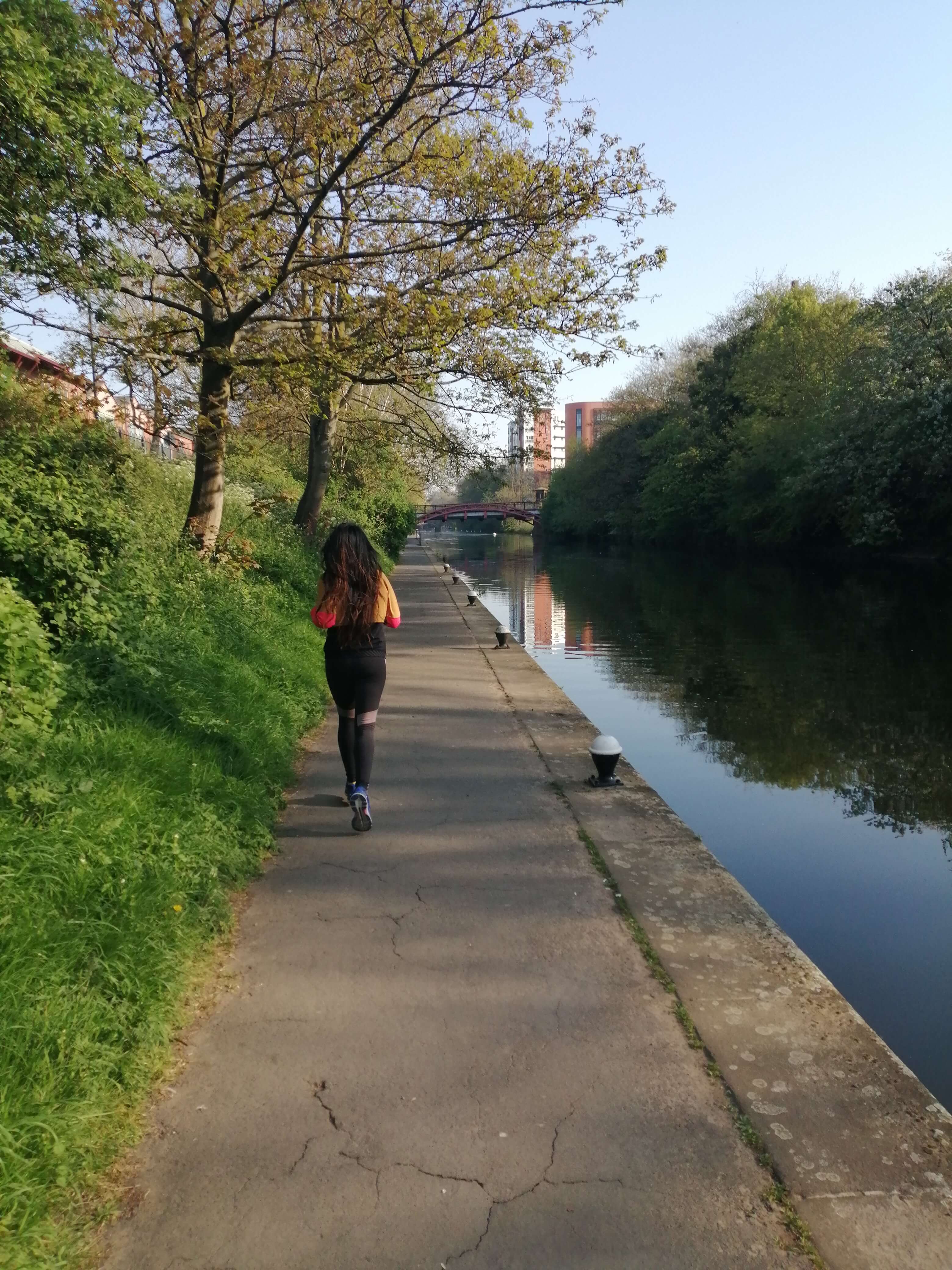 Woman_Running_Next_To_River